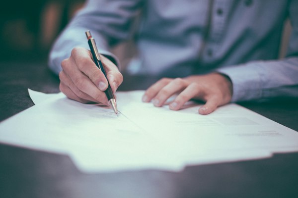 Signing insurance paperwork